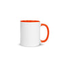 White ceramic blank coffee mug with orange rim, handle, and inside