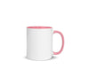 White ceramic blank coffee mug with pink rim, handle, and inside